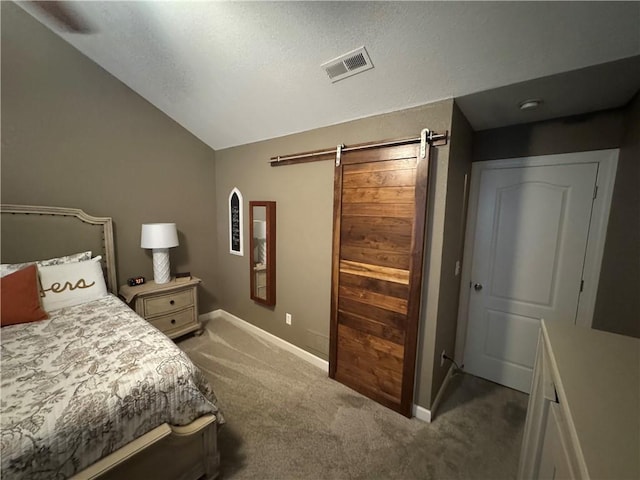 21086 Millridge St, Spring Hill, KS 66083 - carpeted bedroom featuring a barn door, lofted ceiling, and a textured ceiling