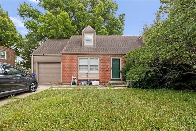 900 S Hunter Dr, Olathe, KS 66061 - view of front of home featuring a garage, brick siding, concrete driveway, and roof with shingles