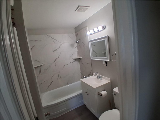 3304 Norton St, Kansas City, MO 64128 - bathroom with vanity and bathtub / shower combination