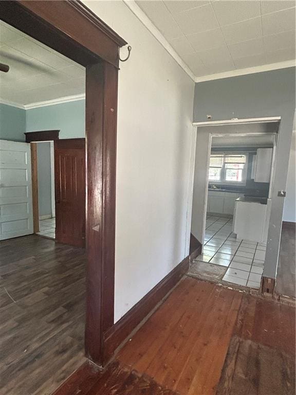 209 S Prairie, Yates Center, KS 66783 - hallway featuring ornamental molding and wood finished floors