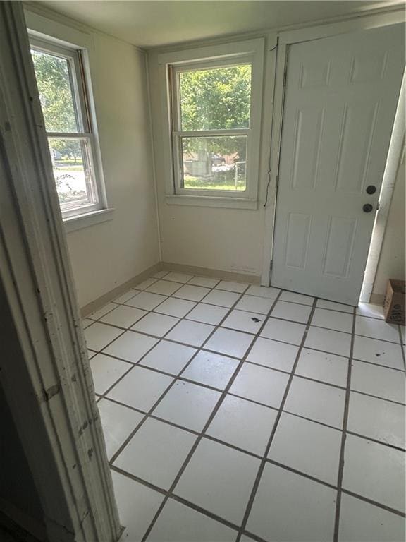 209 S Prairie, Yates Center, KS 66783 - spare room featuring light tile patterned floors