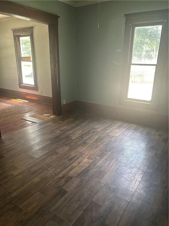 209 S Prairie, Yates Center, KS 66783 - unfurnished room with dark wood-type flooring