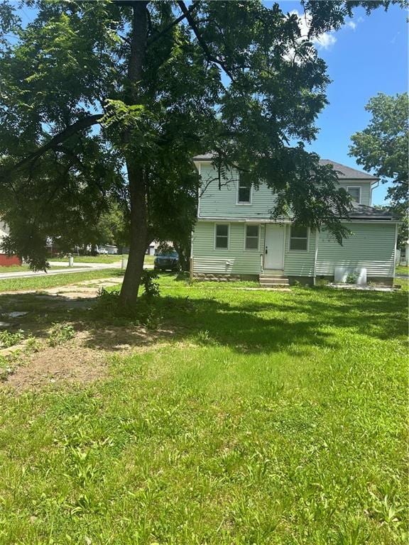209 S Prairie, Yates Center, KS 66783 - view of green lawn featuring entry steps