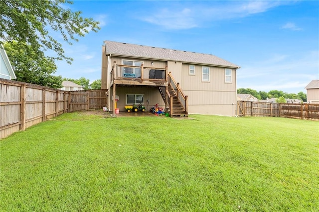 20335 W 220th Ter, Spring Hill, KS 66083 - back of property with stairway, a fenced backyard, and a wooden deck