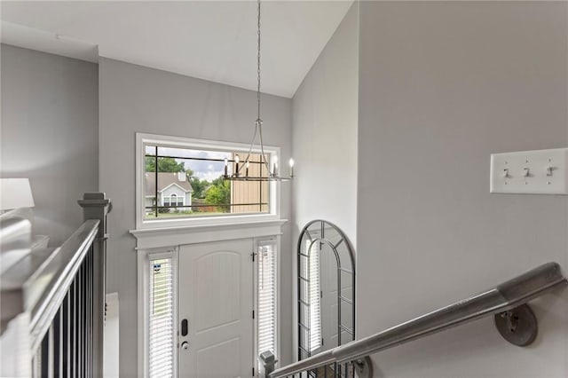 20335 W 220th Ter, Spring Hill, KS 66083 - foyer entrance featuring a chandelier and high vaulted ceiling