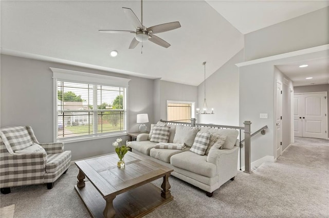 20335 W 220th Ter, Spring Hill, KS 66083 - carpeted living room featuring a chandelier, ceiling fan, vaulted ceiling, and recessed lighting