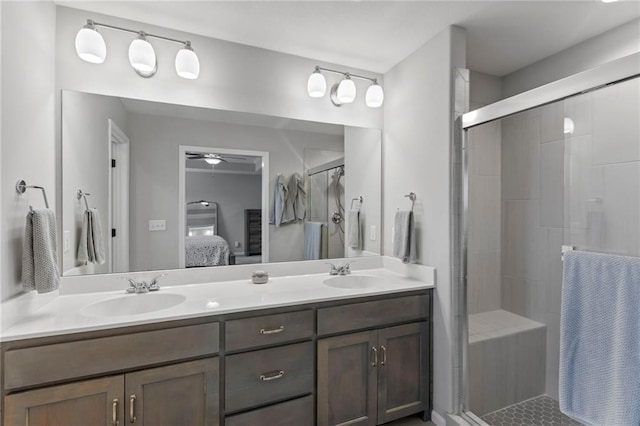 20335 W 220th Ter, Spring Hill, KS 66083 - ensuite bathroom featuring double vanity, a stall shower, and a ceiling fan