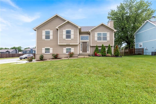 20335 W 220th Ter, Spring Hill, KS 66083 - raised ranch with a chimney