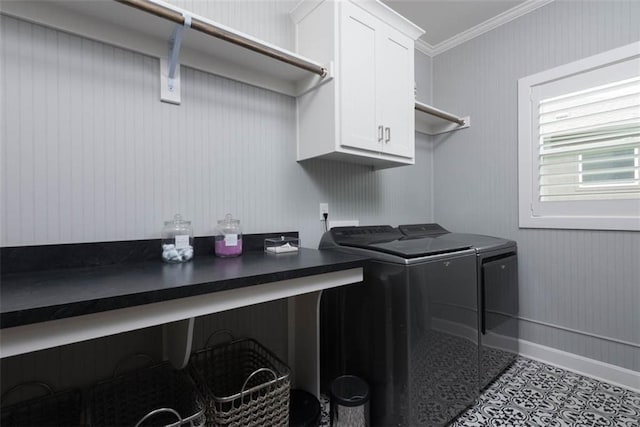 14423 N 145th St, Basehor, KS 66007 - laundry room featuring cabinet space, washer and dryer, and ornamental molding