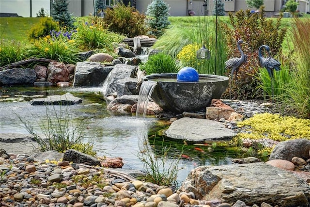 14423 N 145th St, Basehor, KS 66007 - view of yard featuring a garden pond