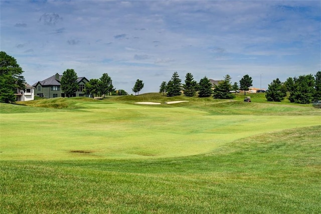 14423 N 145th St, Basehor, KS 66007 - surrounding community with golf course view and a lawn