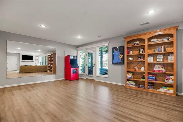 23852 W 124th Ct, Olathe, KS 66061 - exercise room featuring wood finished floors and recessed lighting