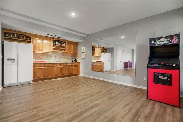 23852 W 124th Ct, Olathe, KS 66061 - kitchen featuring white fridge with ice dispenser, open shelves, light wood-type flooring, brown cabinetry, and recessed lighting