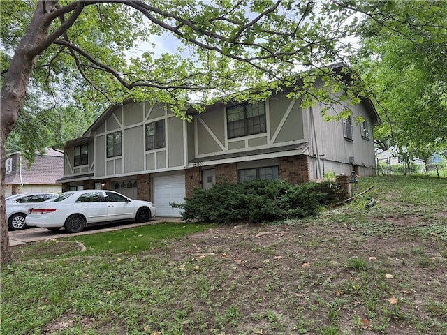 1500 SW 11th St, Blue Springs, MO 64015 - view of front facade with a garage and brick siding
