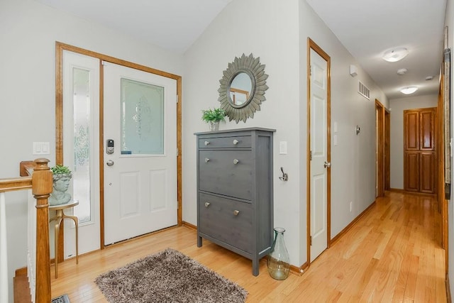 1702 Aspen Ln, Excelsior Springs, MO 64024 - entryway with light wood-style flooring and baseboards