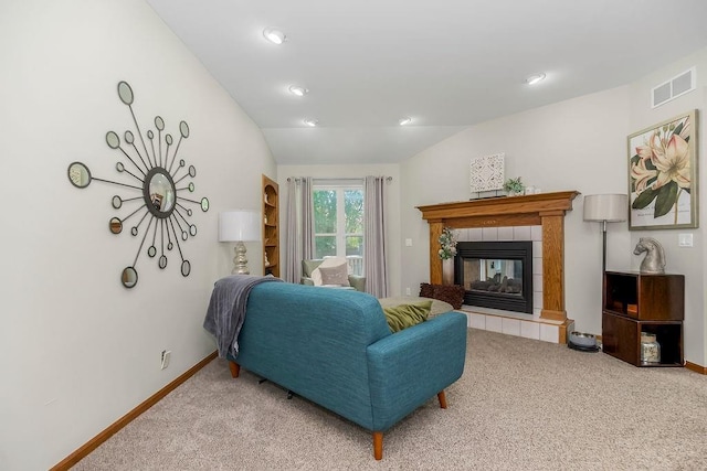 1702 Aspen Ln, Excelsior Springs, MO 64024 - carpeted living room with a fireplace, vaulted ceiling, and recessed lighting