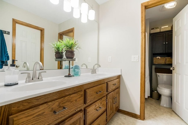 1702 Aspen Ln, Excelsior Springs, MO 64024 - bathroom with double vanity and tile patterned floors