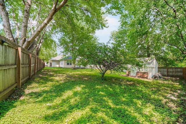 1702 Aspen Ln, Excelsior Springs, MO 64024 - fenced backyard with a shed