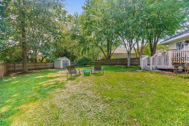 1702 Aspen Ln, Excelsior Springs, MO 64024 - fenced backyard featuring a shed and a deck