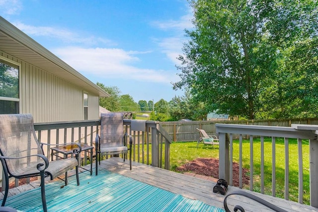 1702 Aspen Ln, Excelsior Springs, MO 64024 - wooden deck with a fenced backyard