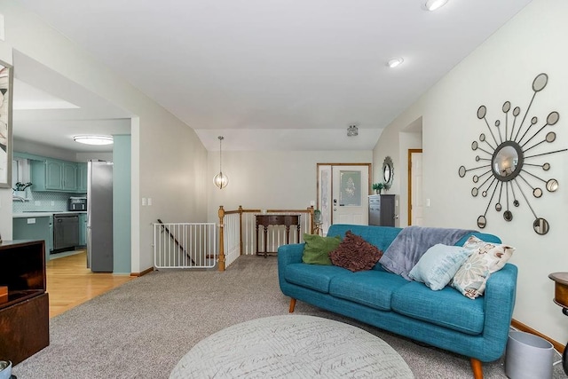 1702 Aspen Ln, Excelsior Springs, MO 64024 - living area with light colored carpet and baseboards