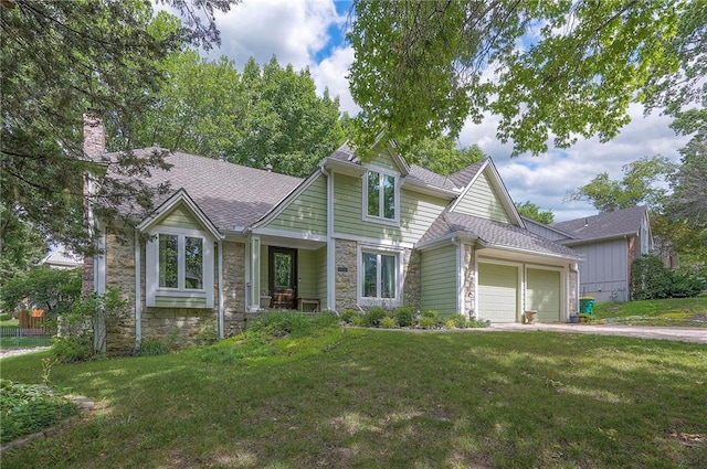 12432 Lamar Ave, Overland Park, KS 66209 - view of front facade featuring stone siding, an attached garage, and a front yard