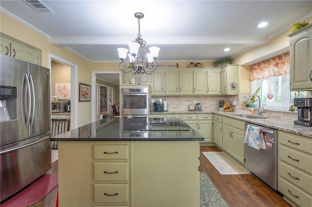 12432 Lamar Ave, Overland Park, KS 66209 - kitchen featuring stainless steel appliances, dark wood-style flooring, a chandelier, beam ceiling, and backsplash