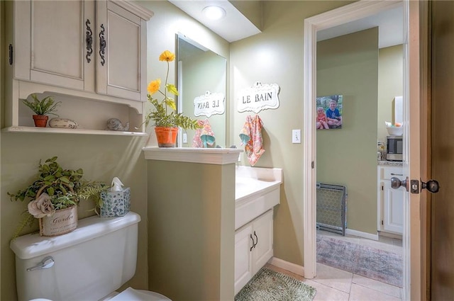 12432 Lamar Ave, Overland Park, KS 66209 - half bath with vanity and tile patterned flooring