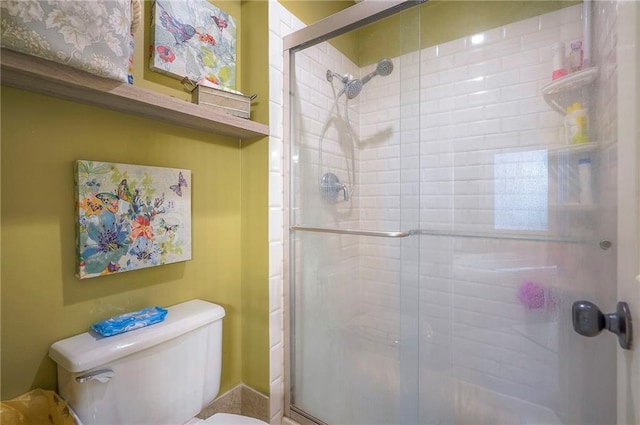 12432 Lamar Ave, Overland Park, KS 66209 - bathroom featuring toilet and a stall shower