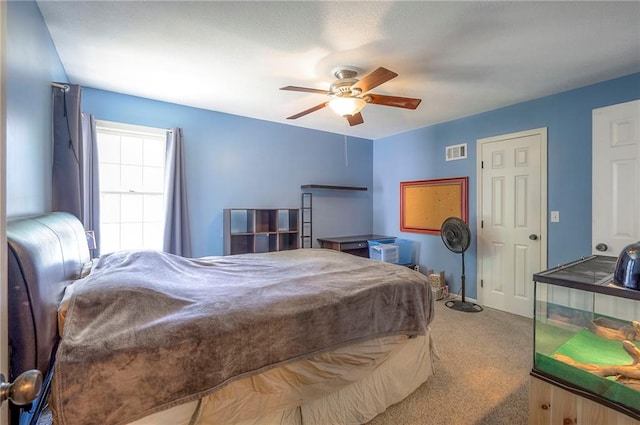 12432 Lamar Ave, Overland Park, KS 66209 - carpeted bedroom with a ceiling fan