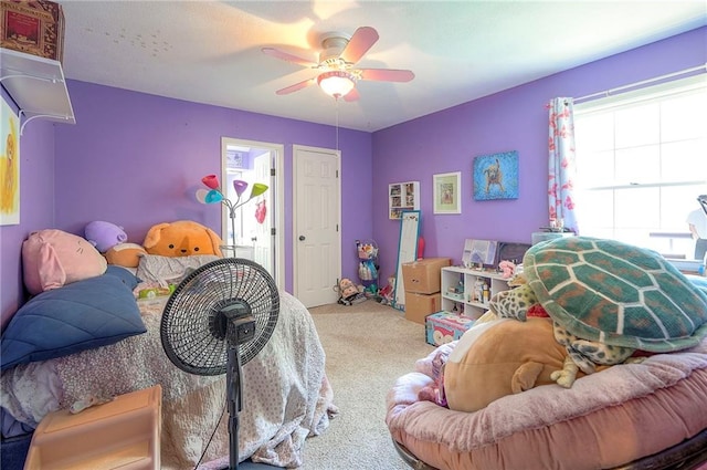 12432 Lamar Ave, Overland Park, KS 66209 - carpeted bedroom with a ceiling fan
