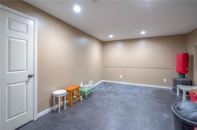 12432 Lamar Ave, Overland Park, KS 66209 - living area featuring a wainscoted wall and recessed lighting