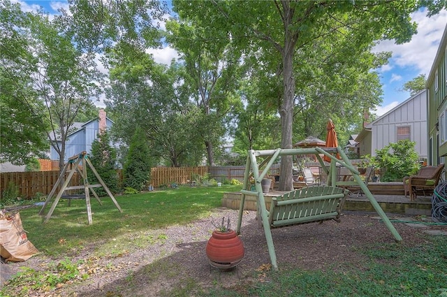 12432 Lamar Ave, Overland Park, KS 66209 - fenced backyard with a playground