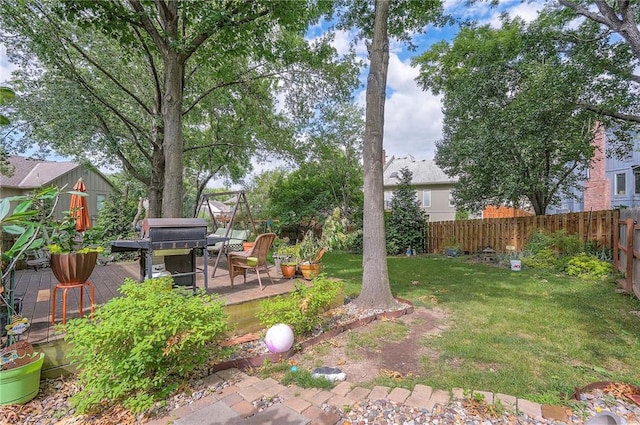 12432 Lamar Ave, Overland Park, KS 66209 - fenced backyard with a wooden deck