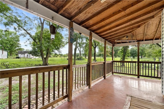 921 E Vine St, Rich Hill, MO 64779 - wooden terrace with a lawn