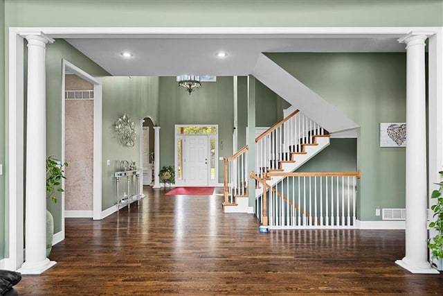 14409 Grandview St, Overland Park, KS 66221 - entrance foyer featuring decorative columns, wood finished floors, recessed lighting, and stairway