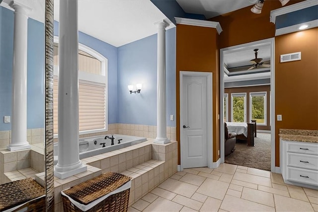 14409 Grandview St, Overland Park, KS 66221 - full bathroom featuring ornate columns, a ceiling fan, a garden tub, and vanity