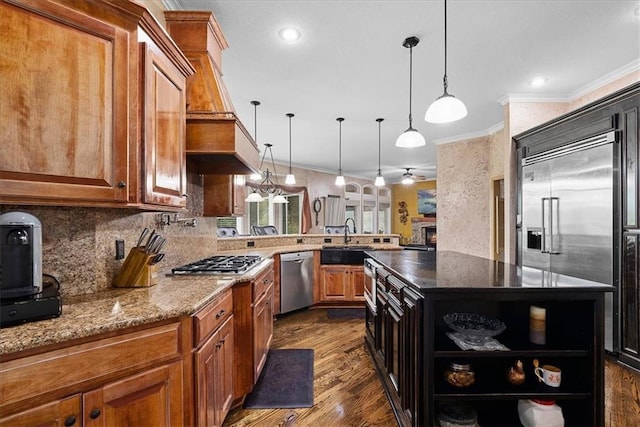 14409 Grandview St, Overland Park, KS 66221 - kitchen with stainless steel appliances, crown molding, open shelves, dark wood-style floors, and custom range hood