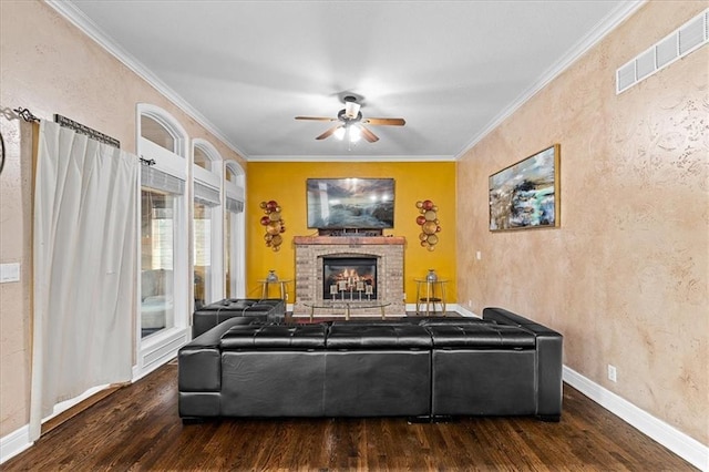 14409 Grandview St, Overland Park, KS 66221 - living area with wood finished floors, a ceiling fan, ornamental molding, a brick fireplace, and a textured wall