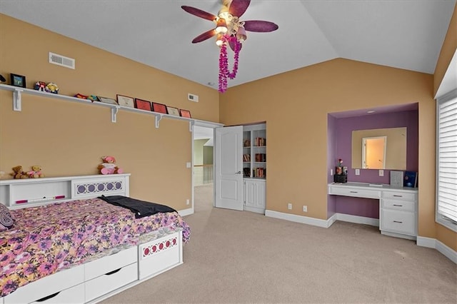 14409 Grandview St, Overland Park, KS 66221 - bedroom featuring light carpet, vaulted ceiling, multiple windows, and built in study area
