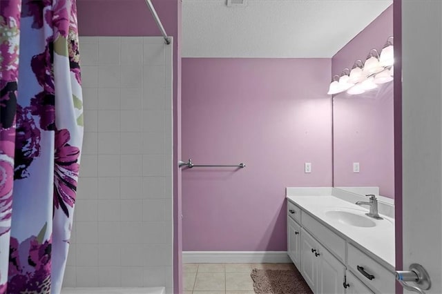 14409 Grandview St, Overland Park, KS 66221 - full bathroom with tile patterned flooring, tiled shower, and vanity