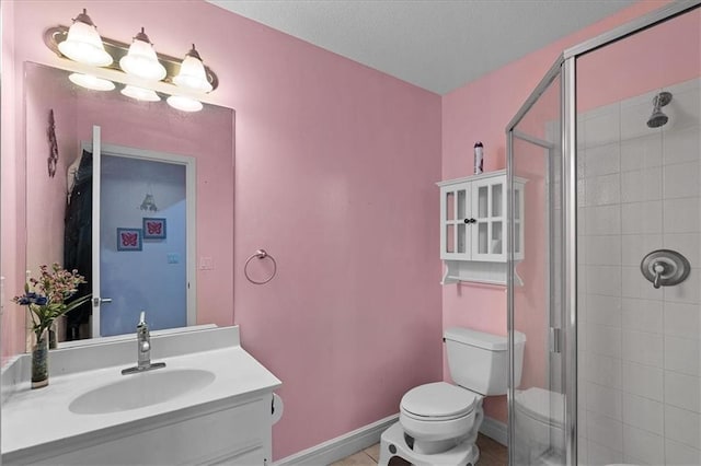 14409 Grandview St, Overland Park, KS 66221 - bathroom featuring vanity, a shower stall, and tile patterned flooring
