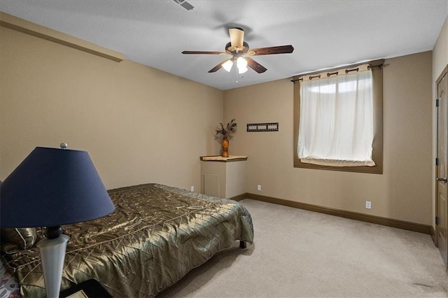 14409 Grandview St, Overland Park, KS 66221 - carpeted bedroom with baseboards and a ceiling fan
