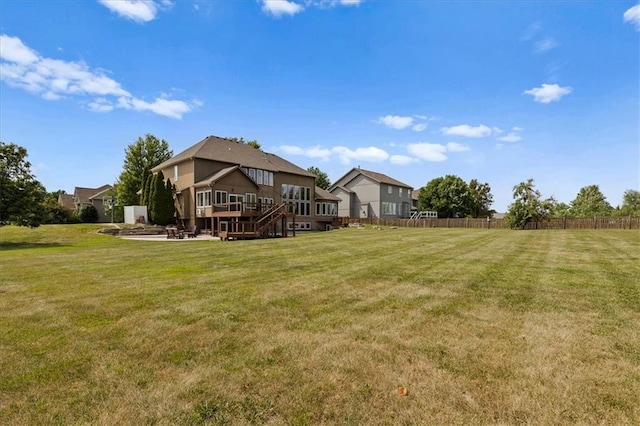 14409 Grandview St, Overland Park, KS 66221 - view of yard featuring a deck and a patio area