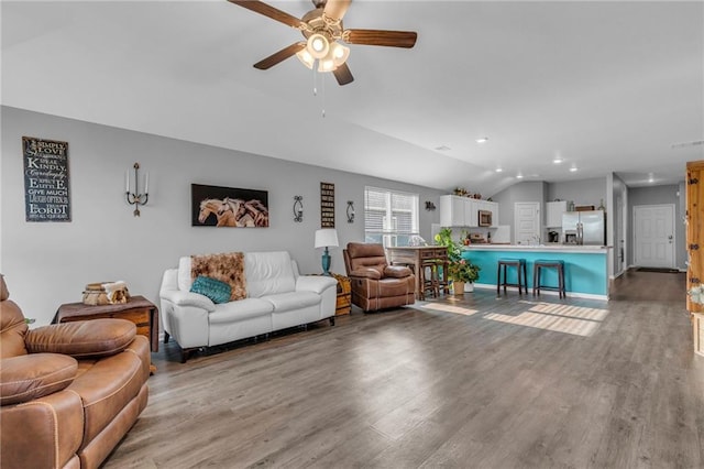 20367 W 193rd Ter, Spring Hill, KS 66083 - living room featuring ceiling fan, lofted ceiling, light wood-type flooring, and recessed lighting