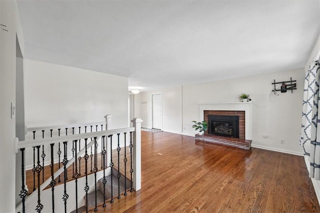 8815 W 81st St, Overland Park, KS 66204 - living room with wood finished floors and a brick fireplace