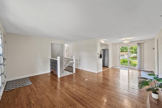 8815 W 81st St, Overland Park, KS 66204 - spare room featuring wood finished floors and baseboards