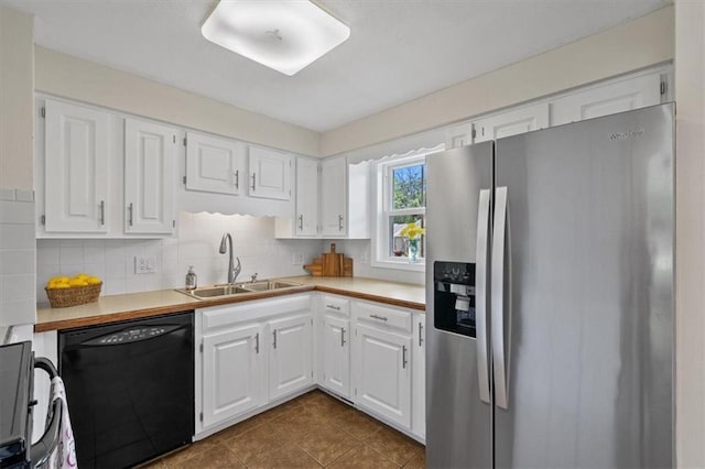 8815 W 81st St, Overland Park, KS 66204 - kitchen with stainless steel refrigerator with ice dispenser, dishwasher, light countertops, white cabinets, and dark tile patterned flooring