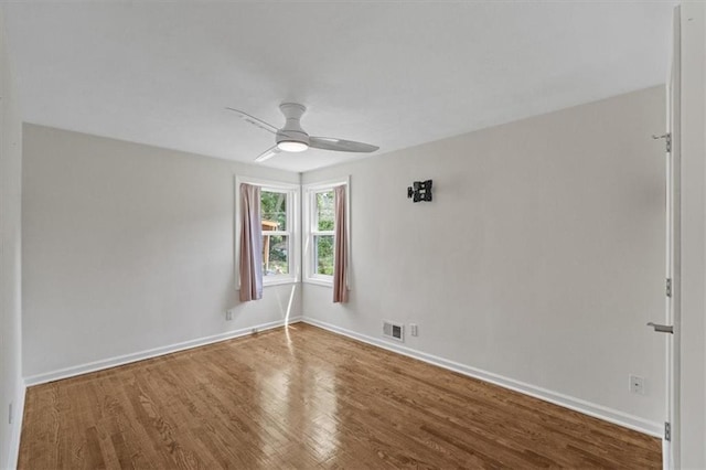 8815 W 81st St, Overland Park, KS 66204 - empty room with wood finished floors and a ceiling fan