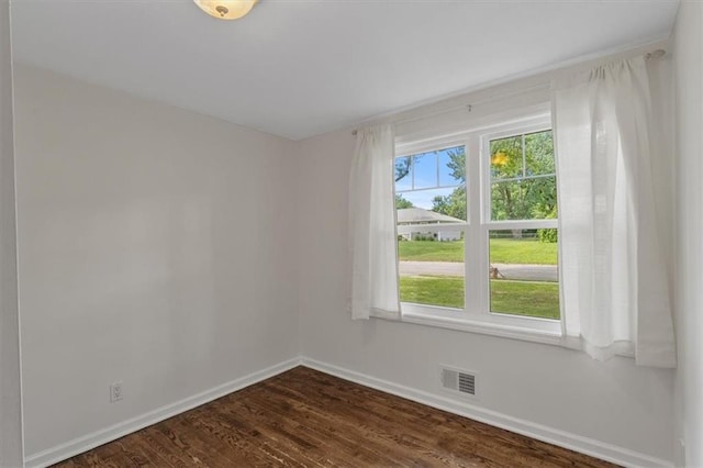8815 W 81st St, Overland Park, KS 66204 - spare room featuring baseboards and dark wood-style flooring